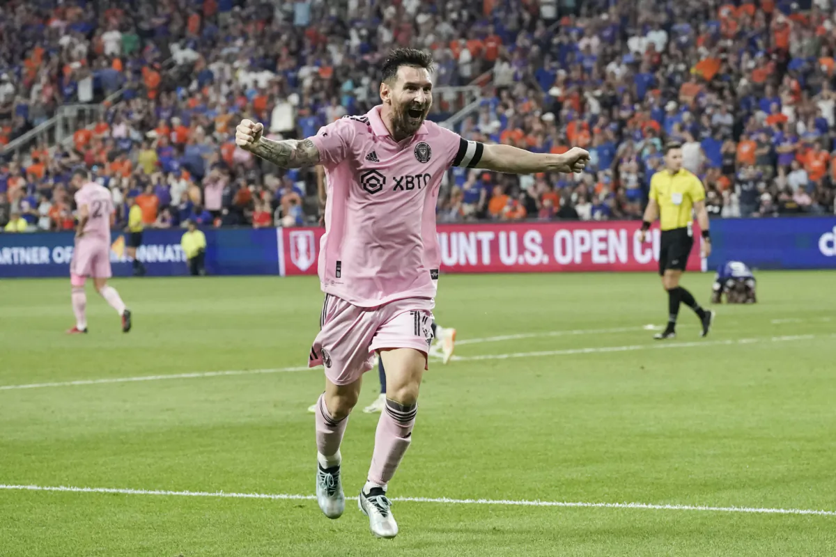 Inter Miami forward Lionel Messi celebrates after a game-tying goal in the 90th minute from teammate Leonardo Campana, not pictured, during the second half of a U.S. Open Cup semifinal soccer match against FC Cincinnati in Cincinnati on Aug. 23, 2023. (Joshua A. Bickel/AP Photo)