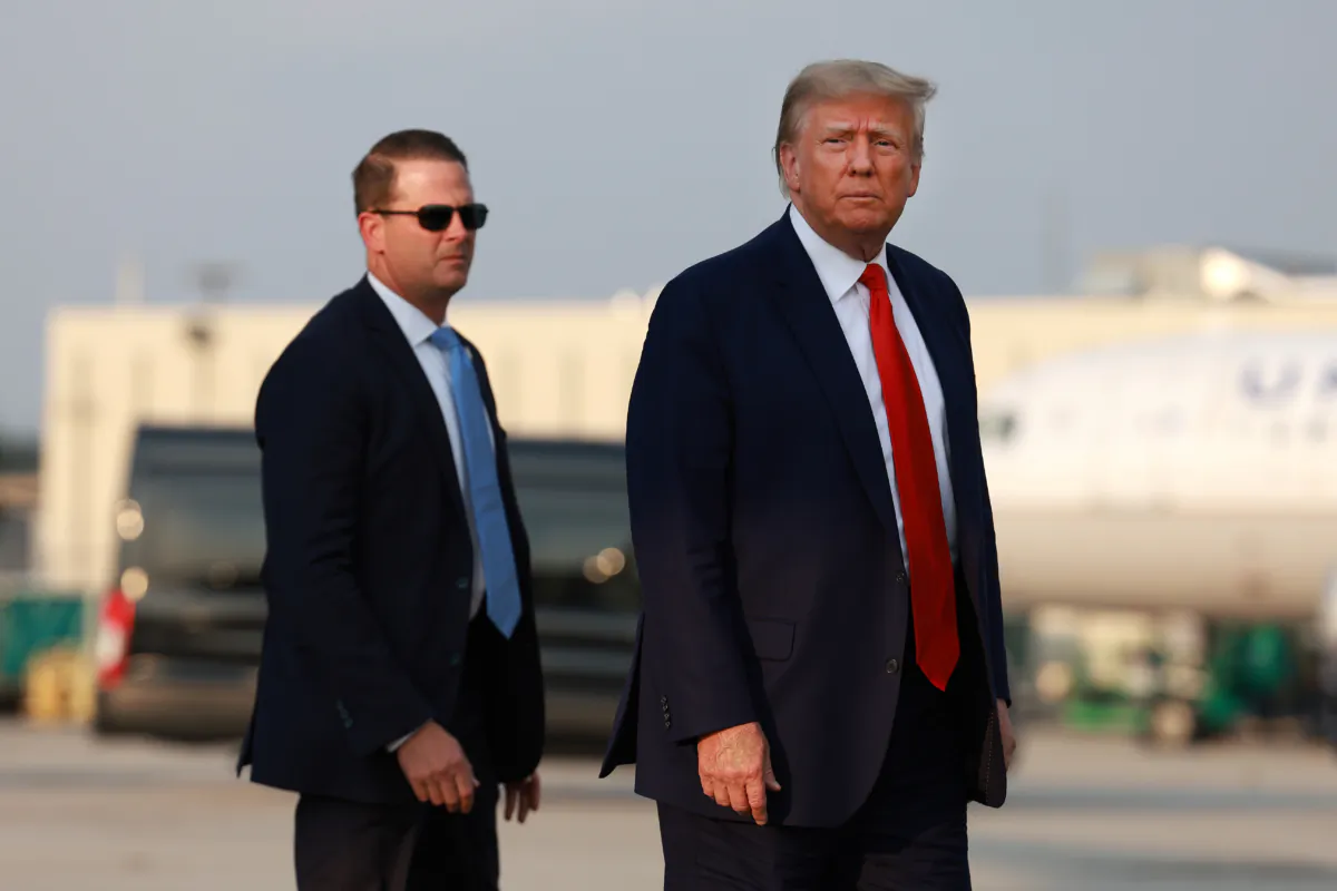 Former President Donald Trump arrives at Atlanta Hartsfield-Jackson International Airport in Atlanta, Ga., on Aug. 24, 2023. (Joe Raedle/Getty Images)