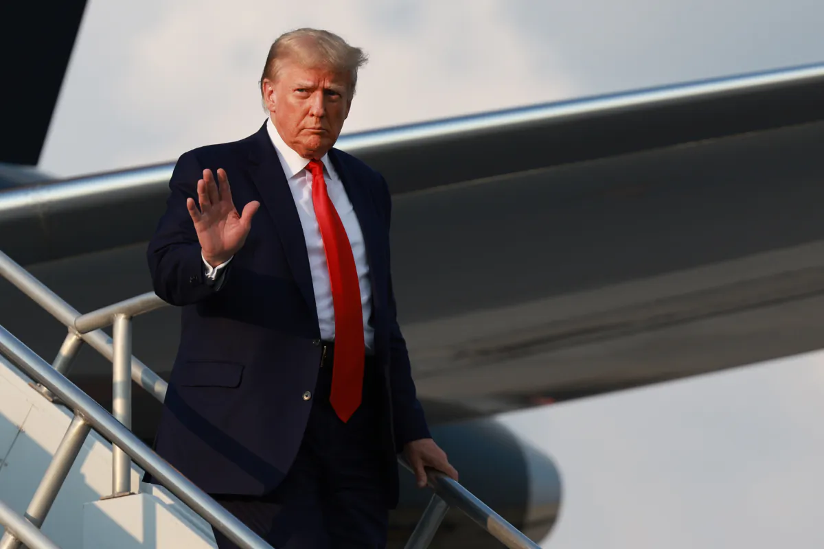 Former President Donald Trump arrives at Atlanta Hartsfield-Jackson International Airport in Atlanta, Ga., on Aug. 24, 2023. (Joe Raedle/Getty Images)