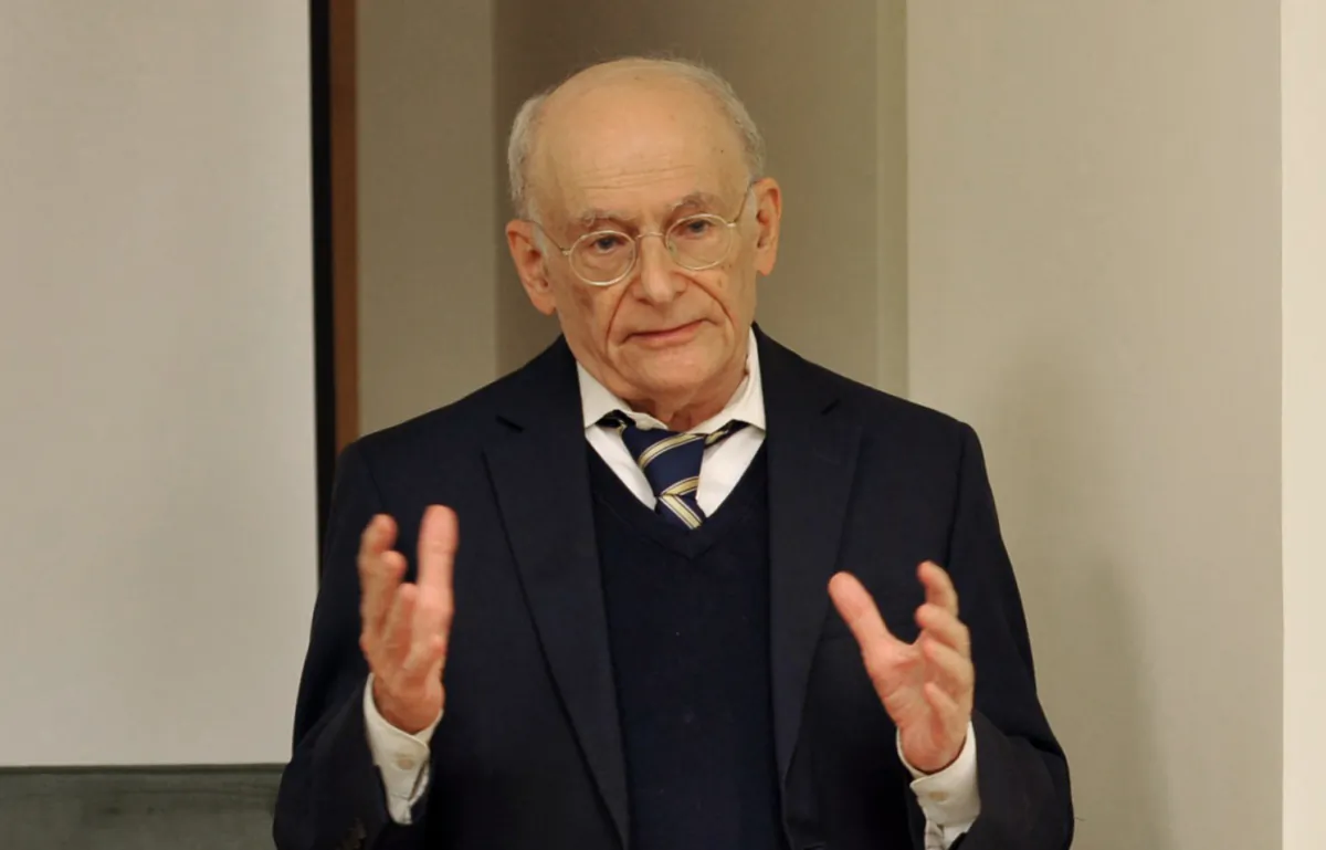 Human rights lawyer David Matas addresses members of the Latvian Parliament on Aug. 23, 2023. (The Epoch Times)