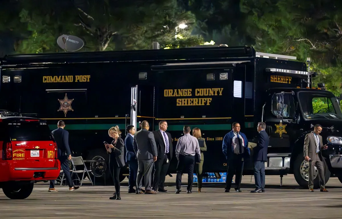 The Orange County aheriff's mobile command post uses the parking lot at Saddleback Church as as staging area in Lake Forest, after a shooting at Cook's Corner in Trabuco Canyon, Calif., on Aug. 23, 2023. (Leonard Ortiz/The Orange County Register via AP)