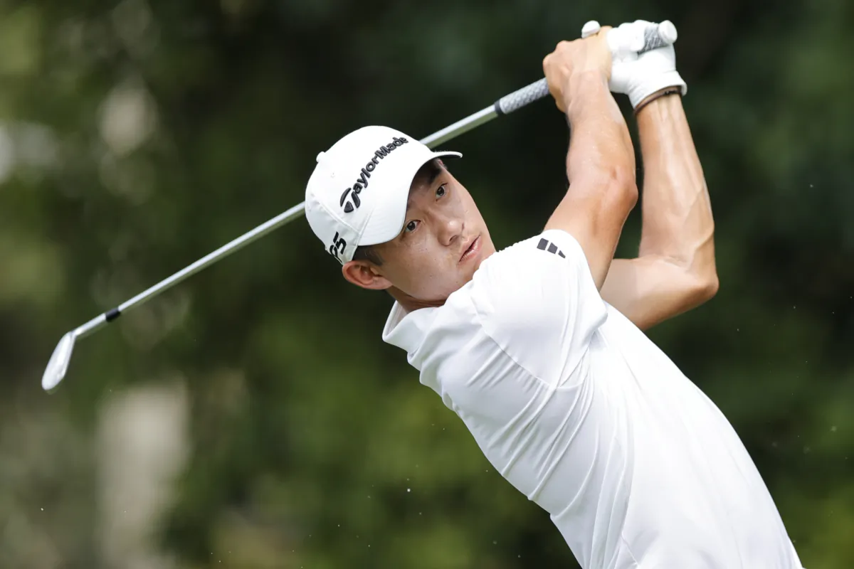Collin Morikawa hits a tee shot on the second hole during the first round of the Tour Championship golf tournament at East Lake Golf Club in Atlanta on Aug. 24, 2023. (Alex Slitz/AP Photo)