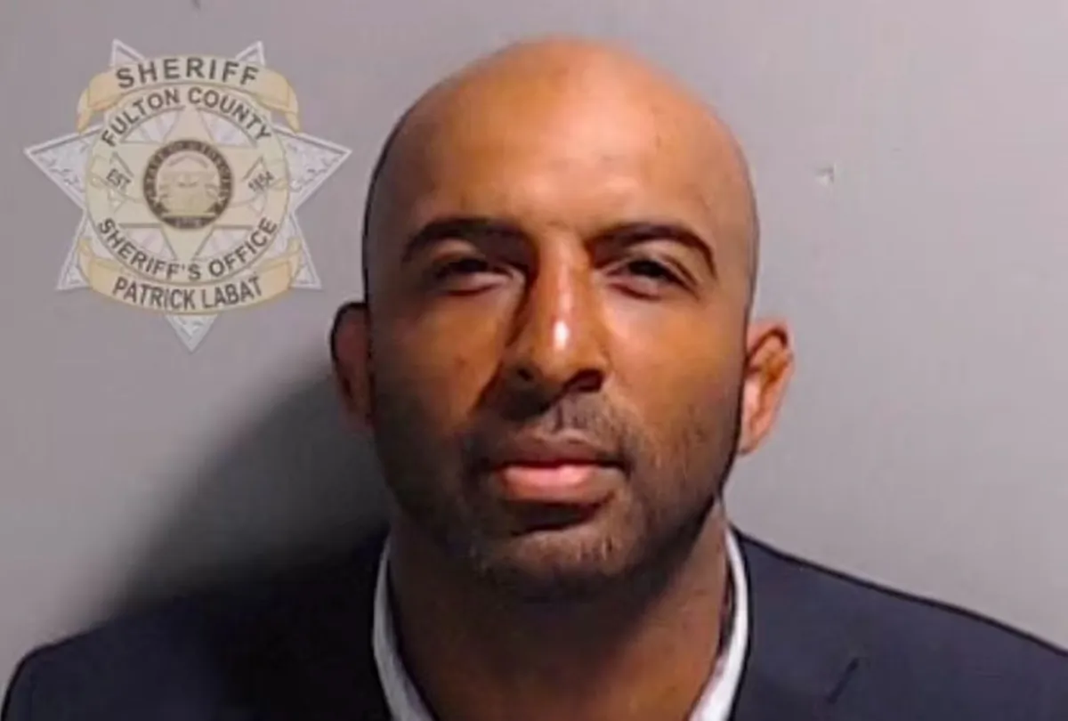 Harrison Floyd, as seen in an undated mugshot, is the only one of the 19 Fulton County defendants to be held in jail without bond. (Fulton County Sheriff's Department)