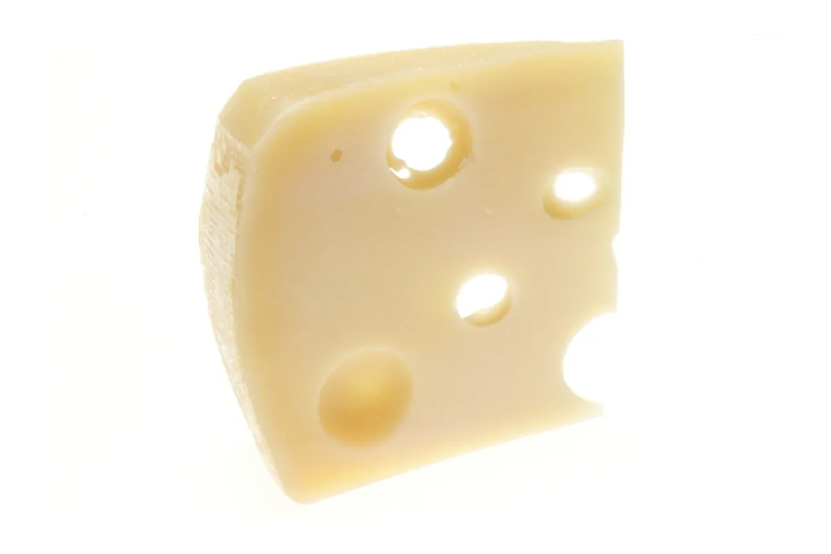 A single wedge of Swiss cheese. (Renee Comet/National Cancer Institute, National Institutes of Health/Public Domain)