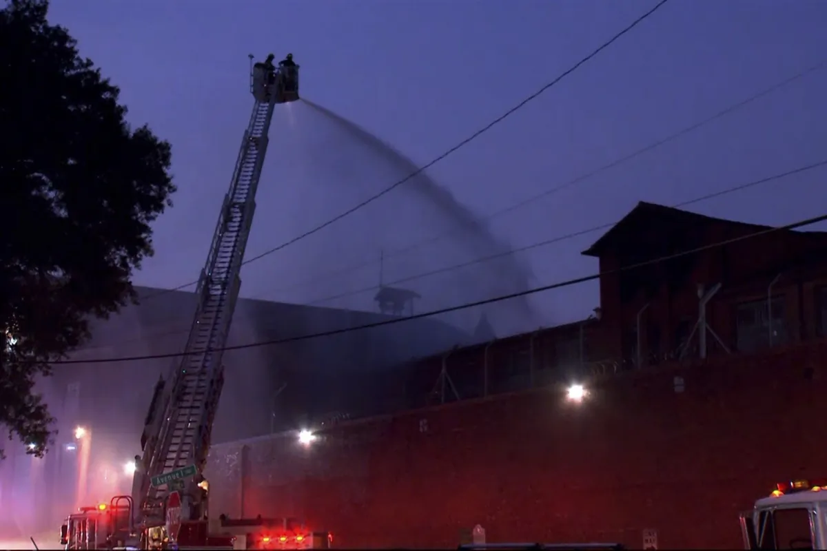 Fire crews battle a blaze at a prison in Huntsville, Texas, on Aug. 25, 2023. (KTRK-TV via AP)