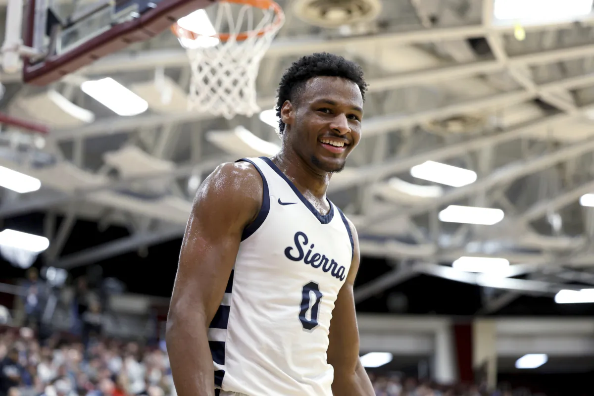 Sierra Canyon's Bronny James smiles during a high school basketball game against Christopher Columbus at the Hoophall Classic, in Springfield, Mass., on Jan. 16, 2023. (Gregory Payan/AP Photo)