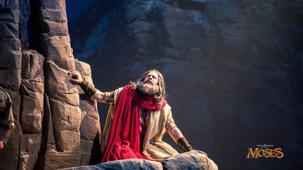 Atop Mount Sinai, the heaviest prop used in this production, Moses (Shane Litchfield) patiently prays and waits for the Ten Commandments to be given to him. (Courtesy of Sight & Sound Theatre)