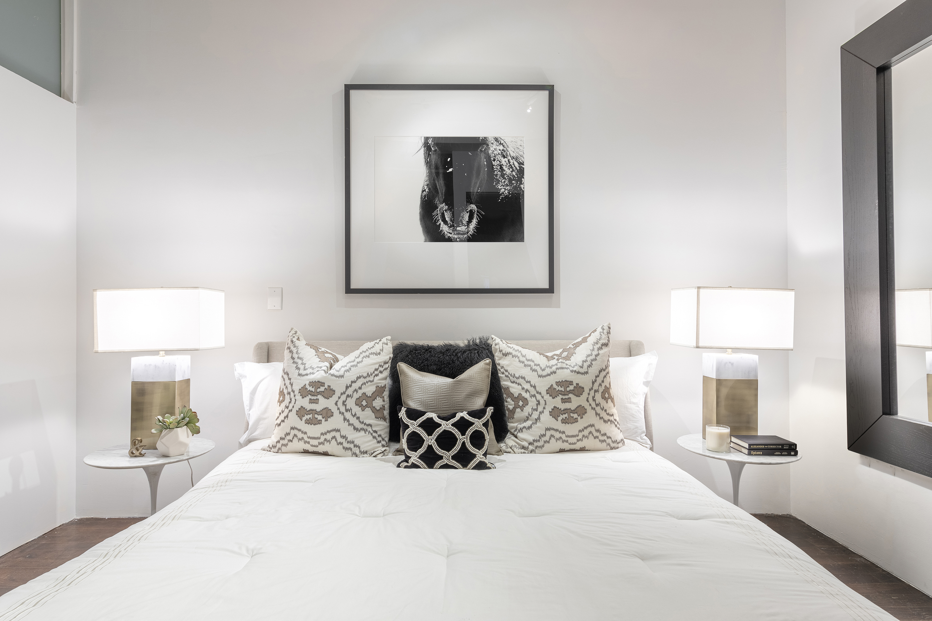 A clerestory helps bring natural light in this windowless master bedroom.