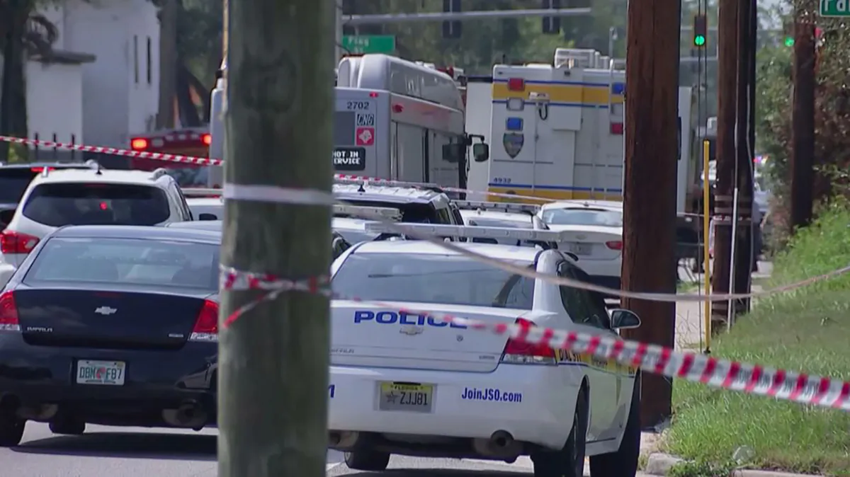 Police cars on the site of a shooting in Jacksonville, Fla., on Aug. 26, 2023, in a still from video. (AFP via Getty Images)