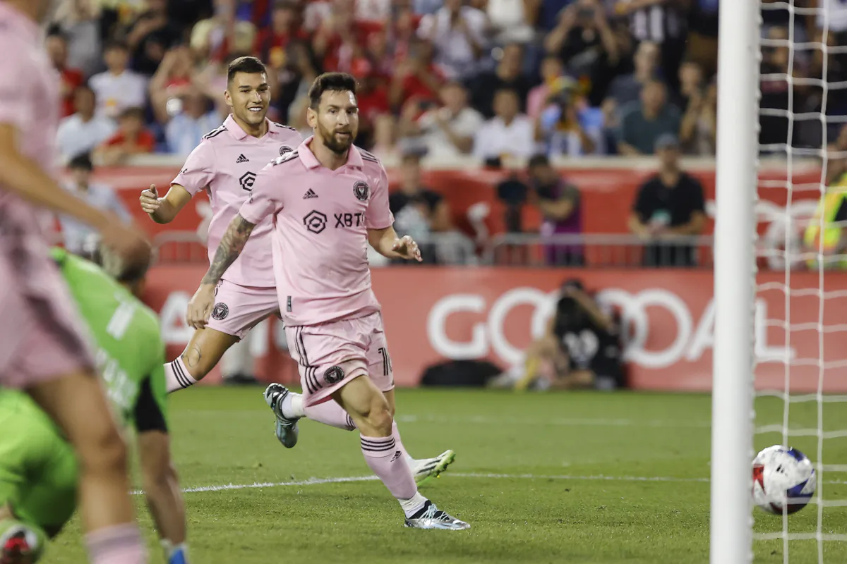 Inter Miami forward Lionel Messi (R) scores against the New York Red Bulls during an MLS soccer match at Red Bull Arena in Harrison, N.J., on Aug. 26, 2023. (Eduardo Munoz Alvarez/AP Photo)