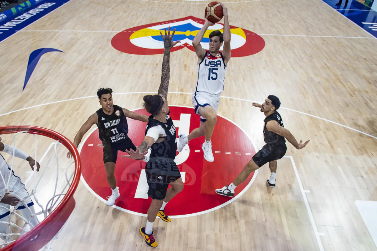 Austin Reaves (15) of USA shoots the ball during the FIBA Basketball World Cup Group C game between United States and New Zealand at Mall of Asia Arena in Pasay, Metro Manila, Philippines, on Aug. 26, 2023. (Ezra Acayan/Getty Images)