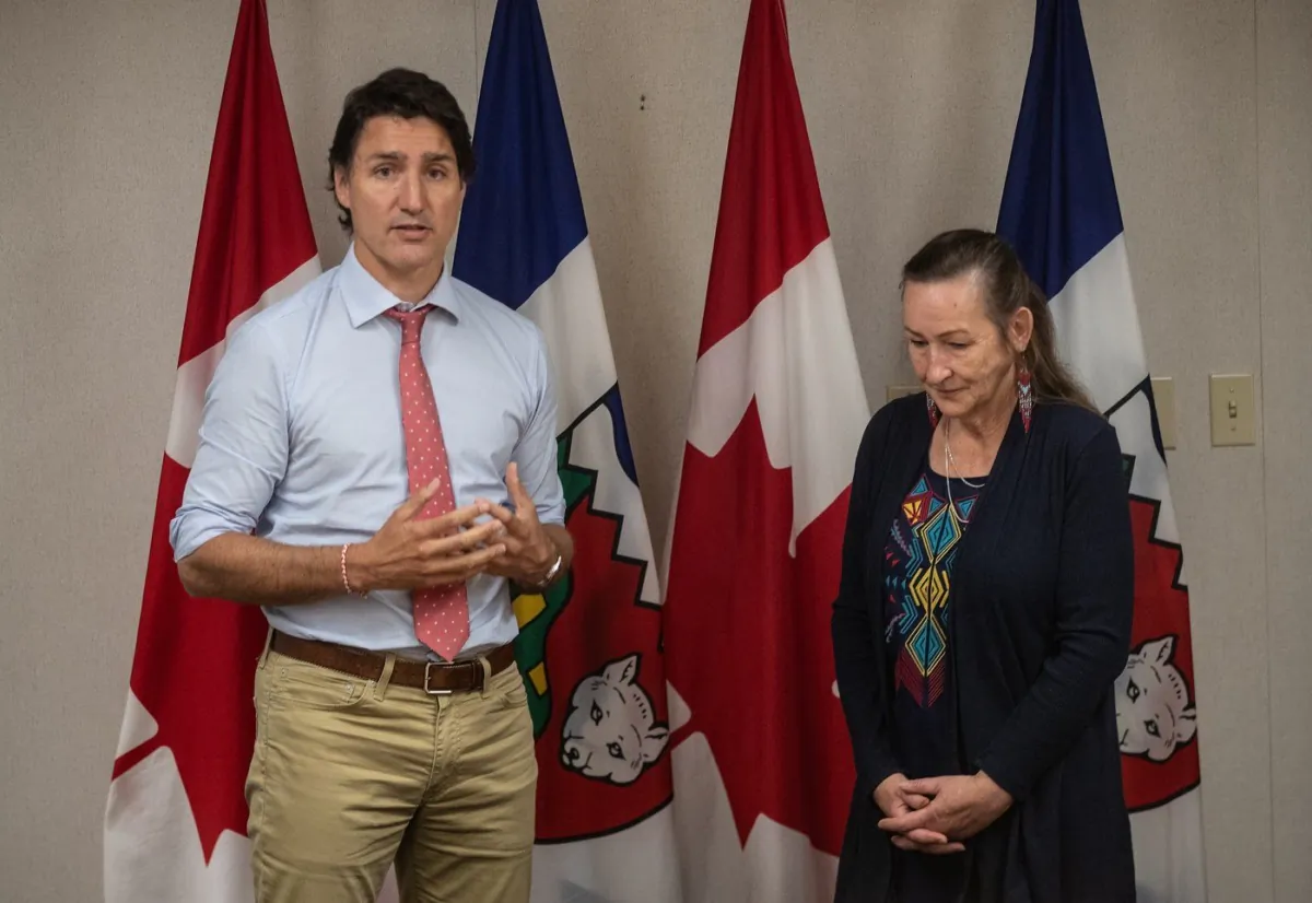 Prime Minister Justin Trudeau and N.W.T. premier Caroline Cochrane meet in Edmonton, Alberta on Aug. 26, 2023. (The Canadian Press/Jason Franson)
