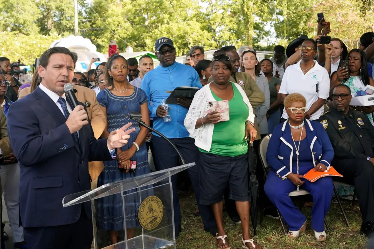 Florida Gov. Ron DeSantis speaks at a prayer vigil for the victims of a shooting a day earlier, in Jacksonville, Fla., on Aug. 27, 2023. (John Raoux/AP Photo)