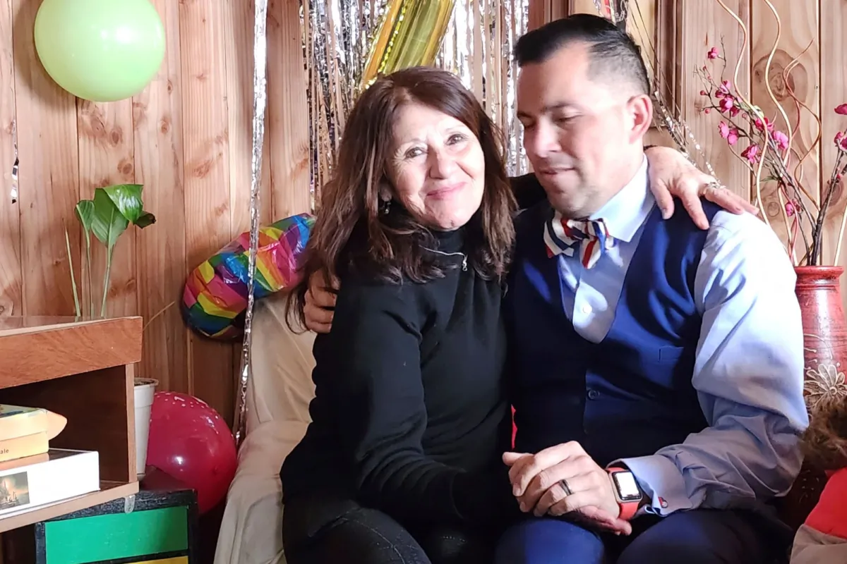 Jimmy Thyden, (R), sits with Maria Angelica Gonzalez, his Chilean birth mother, as they meet for the first time in Valdivia, Chile, on Aug. 17, 2023. (Constanza Del Rio/Nos Buscamos via AP)