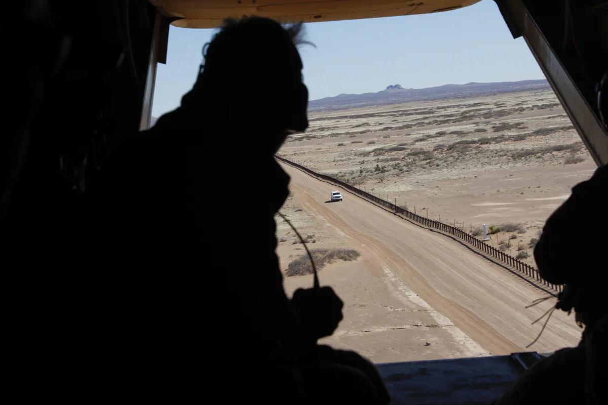 Then Acting Secretary of Defense Patrick Shanahan (L) aboard an Osprey aircraft during a tour of the U.S.-Mexico border, in El Paso, Texas, on Feb. 23, 2019. (Pablo Martinez Monsivais/Pool/Getty Images)