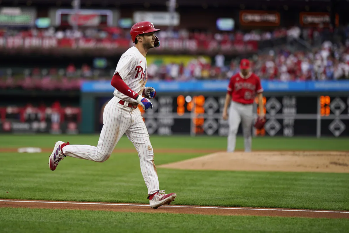 Philadelphia Phillies' Trea Turner rounds the bases after hitting a home run against Los Angeles Angels pitcher Lucas Giolito during the first inning of a baseball game in Philadelphia on Aug. 28, 2023. (Matt Slocum/AP Photo)