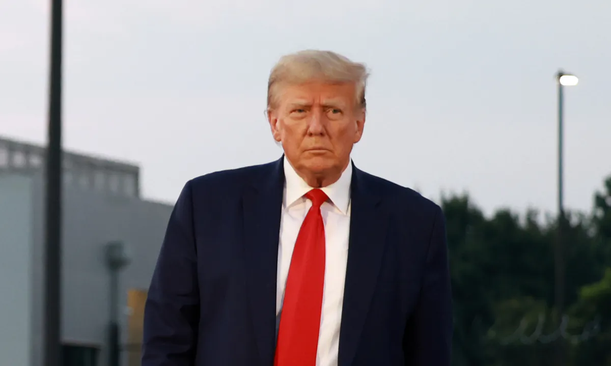 Former President Donald Trump arrives to depart at Atlanta Hartsfield-Jackson International Airport after being booked at the Fulton County jail in Atlanta on Aug. 24, 2023. (Joe Raedle/Getty Images)