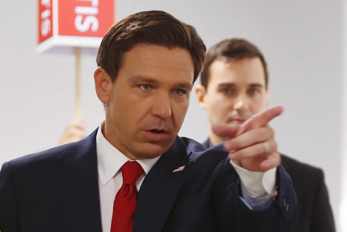 Florida Gov. Ron DeSantis gestures as he speaks in the Spin Room following the first Republican Presidential primary debate at the Fiserv Forum in Milwaukee on Aug. 23, 2023. (Alex Wroblewski/AFP via Getty Images)