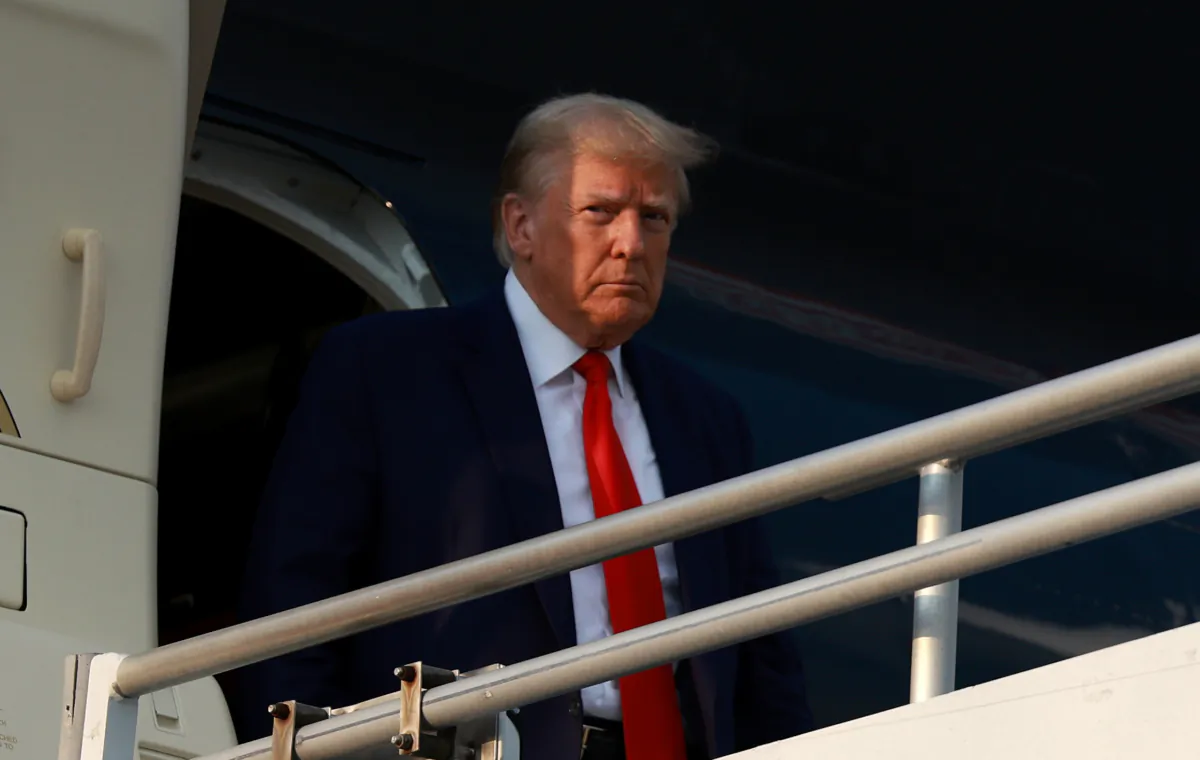 Former President Donald Trump arrives at Atlanta Hartsfield-Jackson International Airport in Atlanta on Aug. 24, 2023. (Joe Raedle/Getty Images)