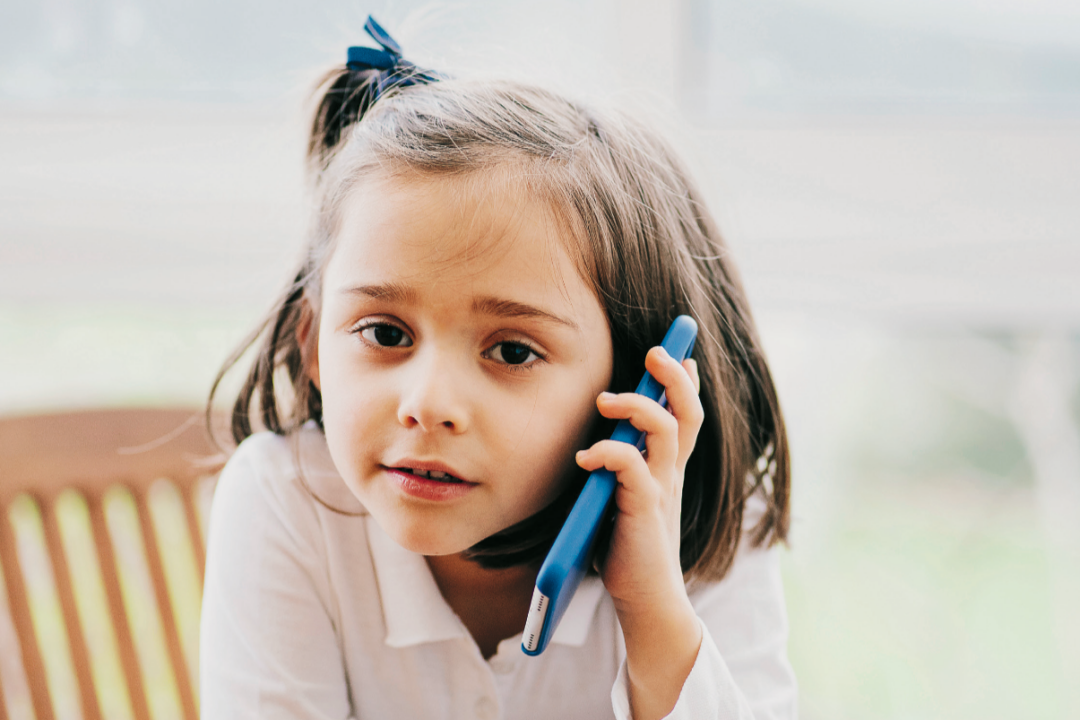 Talking on the phone teaches valuable communication skills and the ability to personalize a message. (DANIELGONZALEZPHOTO/SHUTTERSTOCK)
