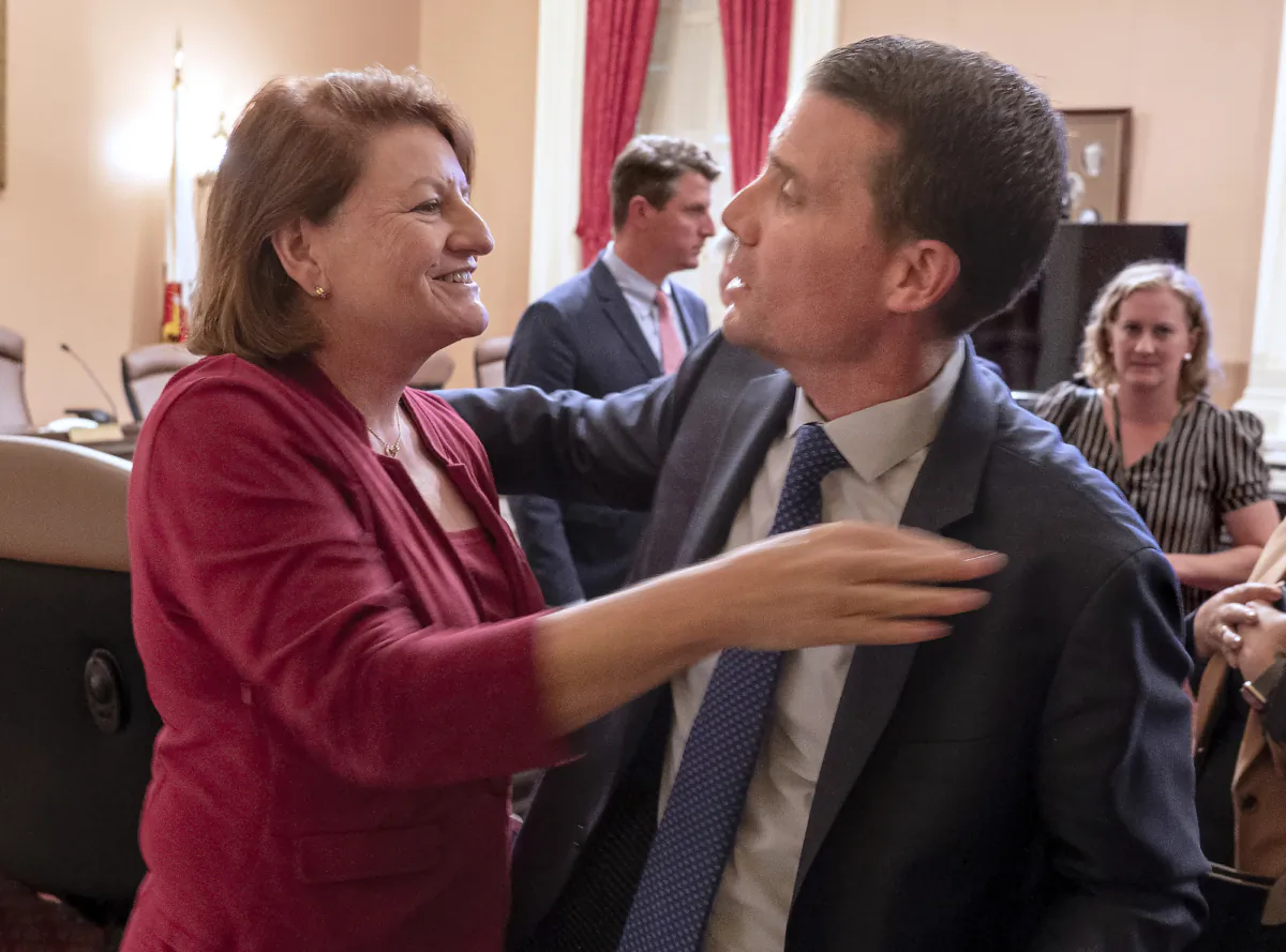 California state Senate President Toni Atkins (L), D-San Diego, hugs Sen. Mike McGuire, D-Healdsburg, after he was named the successor to Atkins at the Capitol in Sacramento, Calif., Aug. 28, 2023. Atkins said McGuire will take over as Senate Leader sometime next year. (AP Photo/Rich Pedroncelli)