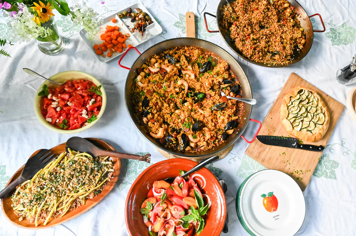All the savory and summer dishes presented for guests at Gretchen’s outdoor party on Friday, Aug. 11, 2023, in Ben Avon. (Teagan Staudenmeier/Pittsburgh Post-Gazette/TNS)