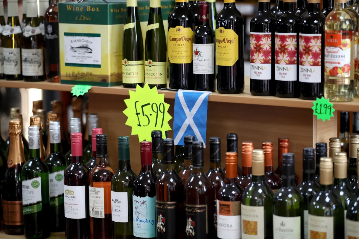 Undated photo of alcohol on shelves in a shop. (Jane Barlow/PA)