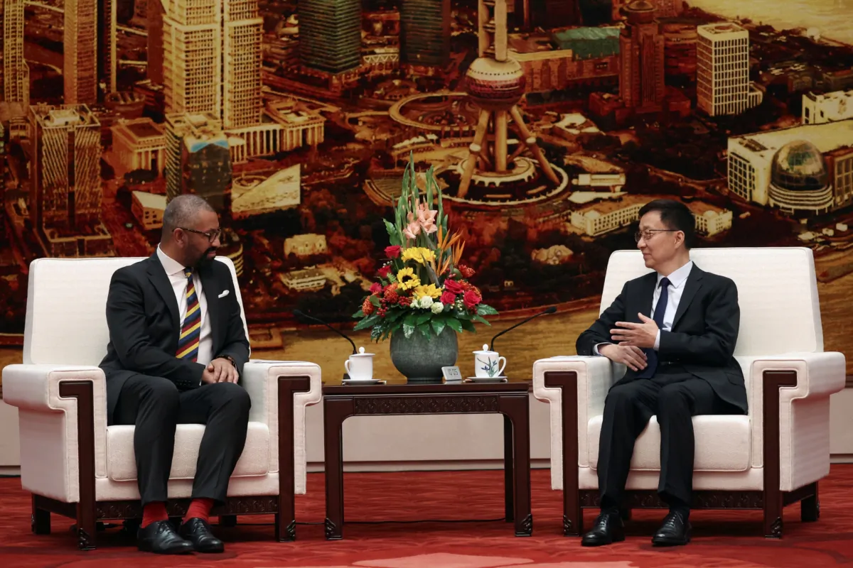 British Foreign Secretary James Cleverly and Chinese Vice President Han Zheng attend a meeting at the Great Hall of the People in Beijing on Aug. 30, 2023. (Florence Lo/Pool/Reuters)