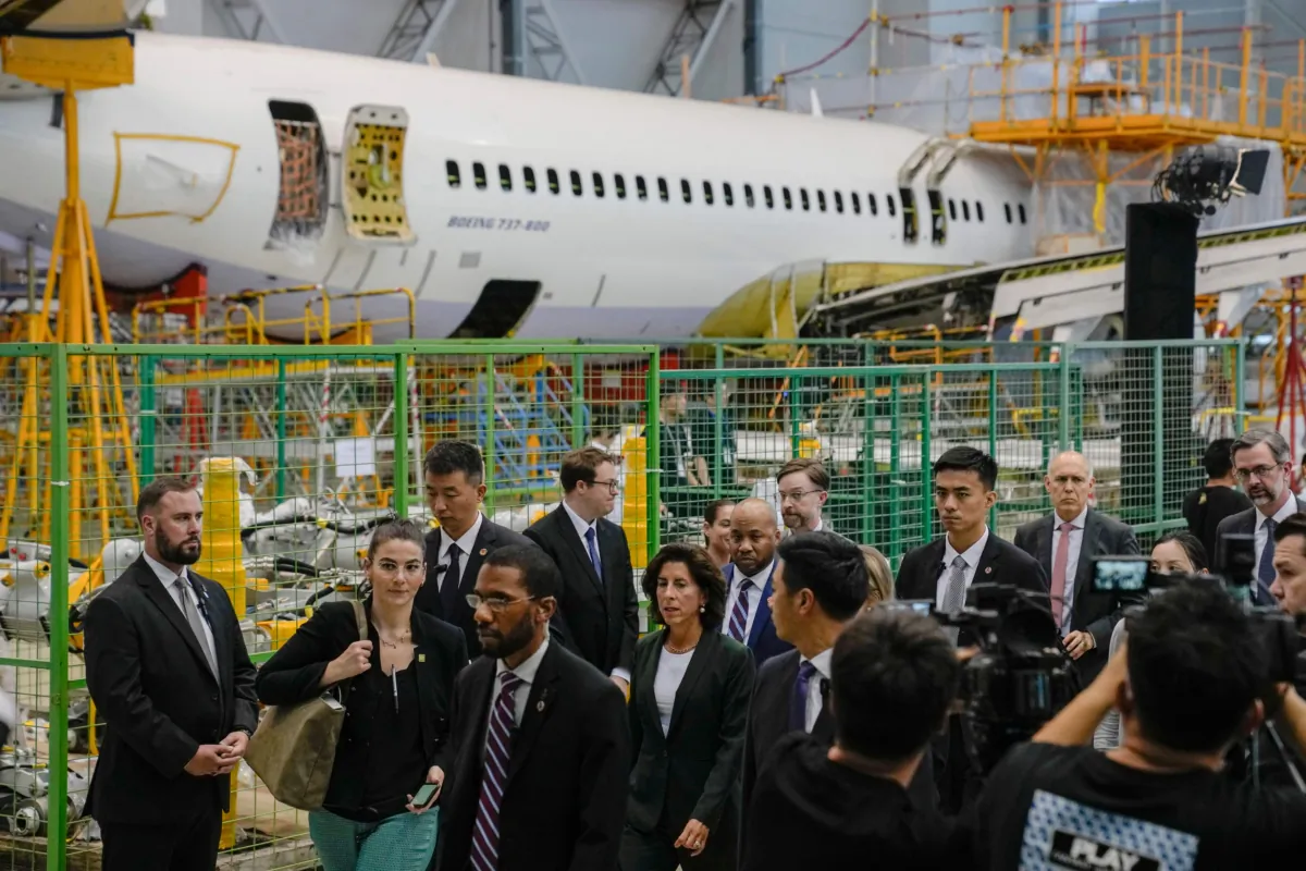 U.S. Commerce Secretary Gina Raimondo (C) leaves after a press conference at the Boeing Shanghai Aviation Service Co., in Shanghai on Aug. 30, 2023. (Andy Wong /POOL/AFP via Getty Images)