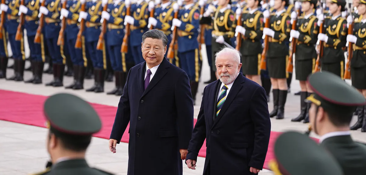 Brazilian President Luiz Inacio Lula da Silva joins Chinese leader Xi Jinping in inspecting troops during a welcome ceremony outside the Great Hall of the People in Beijing on April 14, 2023. (Ken Ishii/Pool/Getty Images)