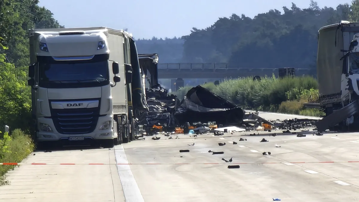 Debris from a truck lies on the highway 2 between Theessen and Burg, Germany, on Aug. 30, 2023. (Cevin Dettlaff/dpa via AP)