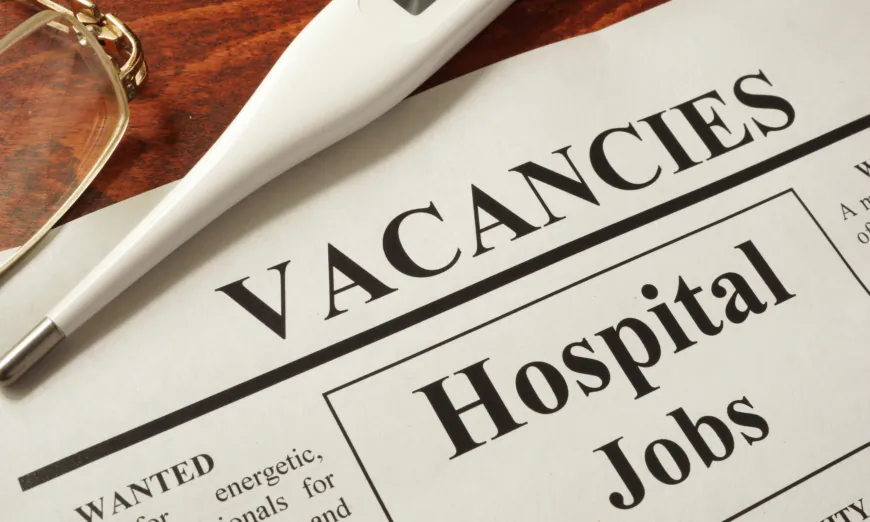 Newspaper with ads hospital jobs vacancy.