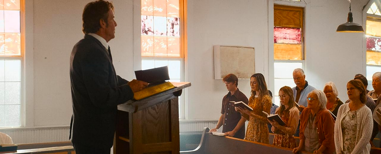 Pastor and congregation in church in THE HILL 