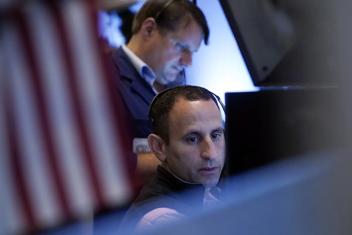 A pair of traders work on the floor of the New York Stock Exchange, on Aug. 30, 2023. (Richard Drew/AP Photo)