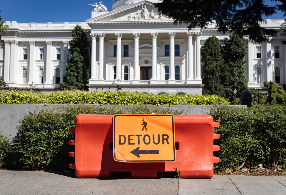 A detour sign next to the California state capitol building in Sacramento, Calif., on Aug. 28, 2023. (John Fredricks/The Epoch Times)