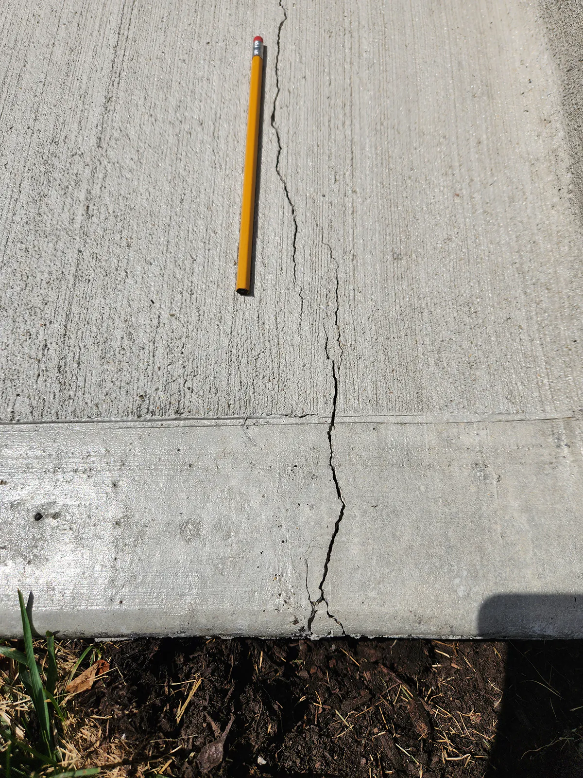 This new concrete sidewalk cracked within months. (Tim Carter/Tribune Content Agency/TNS)