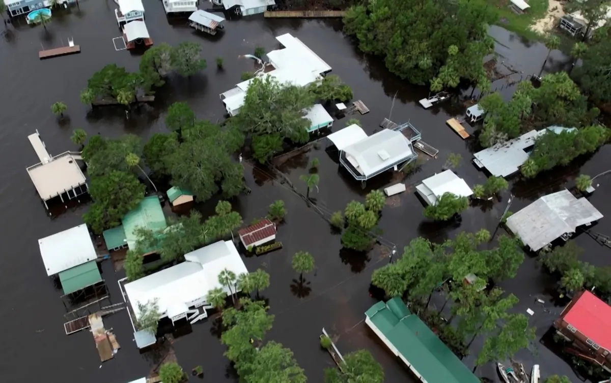Homes surrounded by floodwaters in Steinhatchee, Fla., on Aug. 30, 2023, left behind by Hurricane Idalia. (AP Photo/Daniel Kozin)
