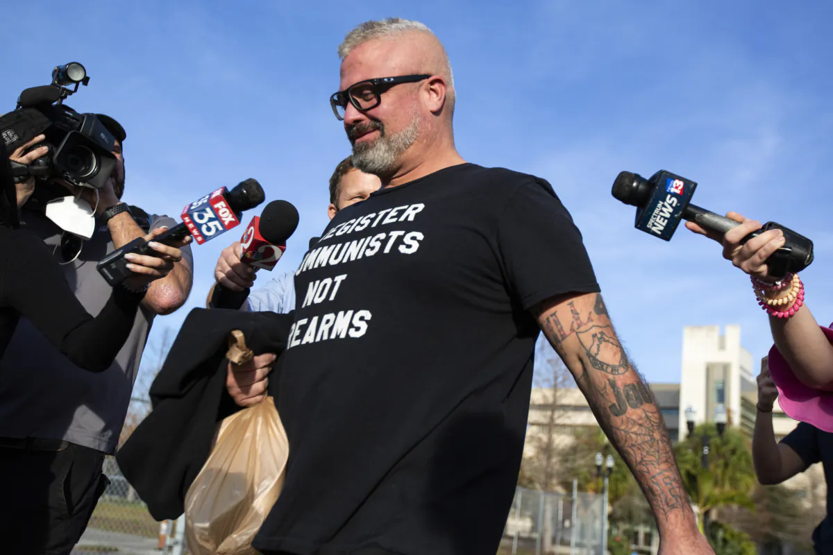 Proud Boys organizer Joseph Biggs walks from the George C. Young Federal Annex Courthouse in Orlando, Fla., on Jan. 20, 2021. (Sam Thomas/Orlando Sentinel via AP)