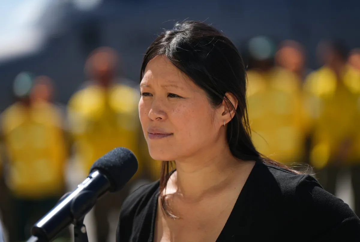 Emergency Management Minister Bowinn Ma pauses while responding to questions at Abbotsford International Airport, in Abbotsford, B.C., on July 23, 2023. (The Canadian Press/Darryl Dyck)