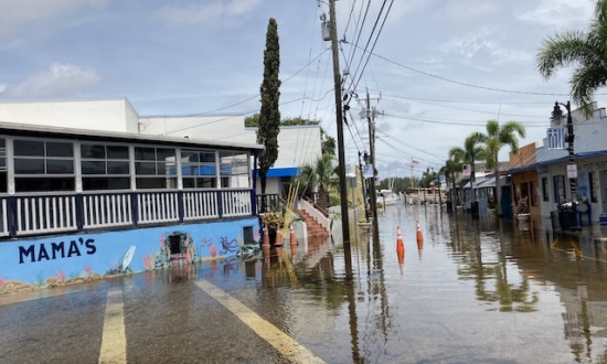 Day After Idalia, Residents Race Time and Tides to Sweep the Sea From Tarpon Springs’ Streets