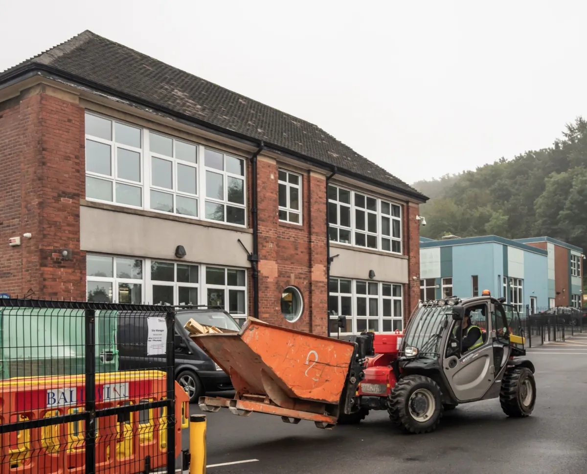 Workmen at one of the schools affected by RAAC concrete, Abbey Lane Primary School in Sheffield, England on Sep. 1, 2023. (PA)