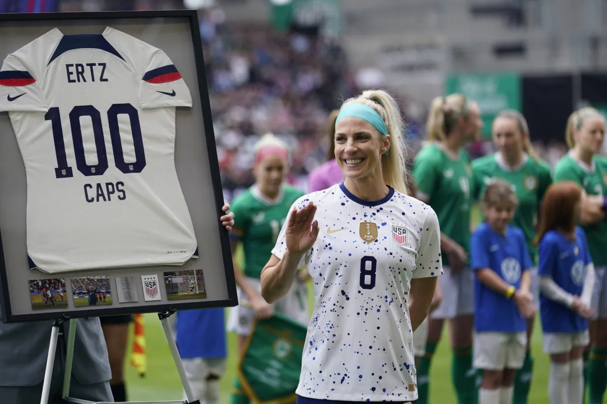 United States midfielder Julie Ertz (8) waves after she was presented a jersey marking her 100th match before an international friendly soccer match against Ireland in Austin, Texas, on April 8, 2023. (Eric Gay/AP Photo)