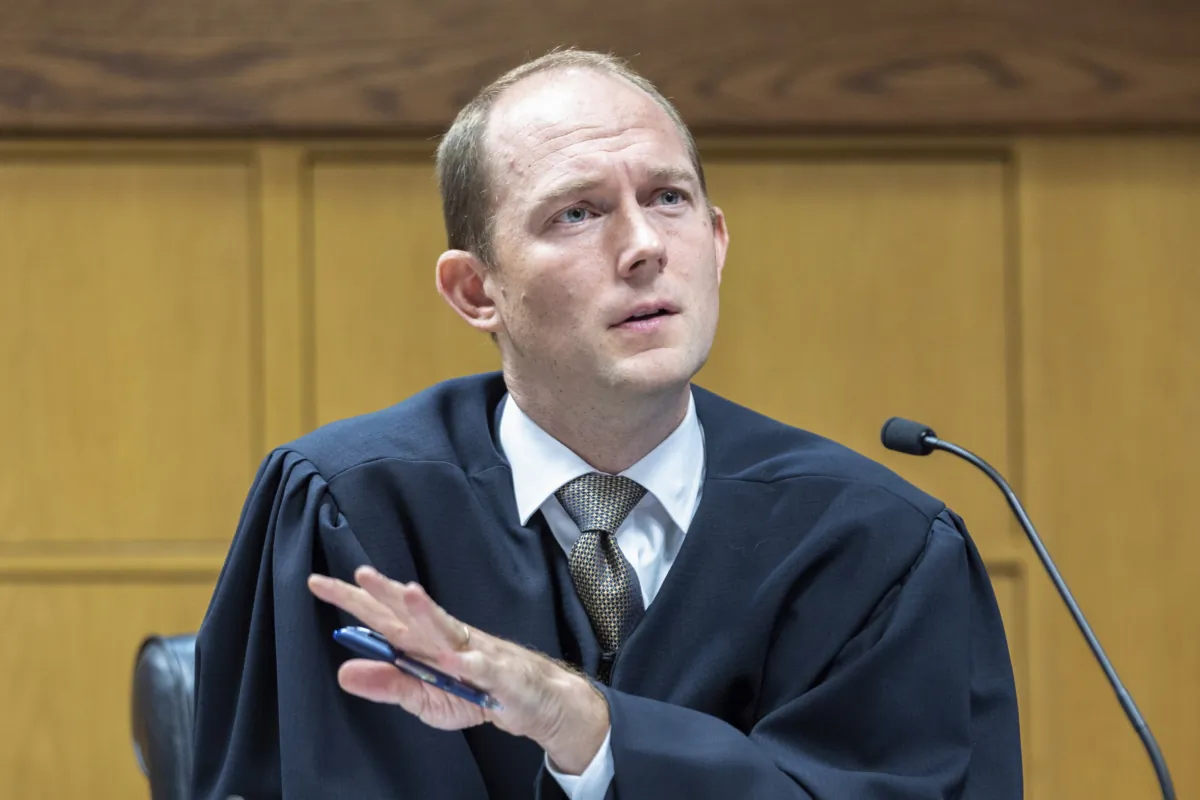 Fulton County Superior Court Judge Scott McAfee presides over a hearing regarding media access in the case against former President Donald Trump and 18 others at the Fulton County Courthouse in Atlanta, Ga., on Aug, 31, 2023. (Arvin Temkar/Pool/Atlanta Journal-Constitution via AP)