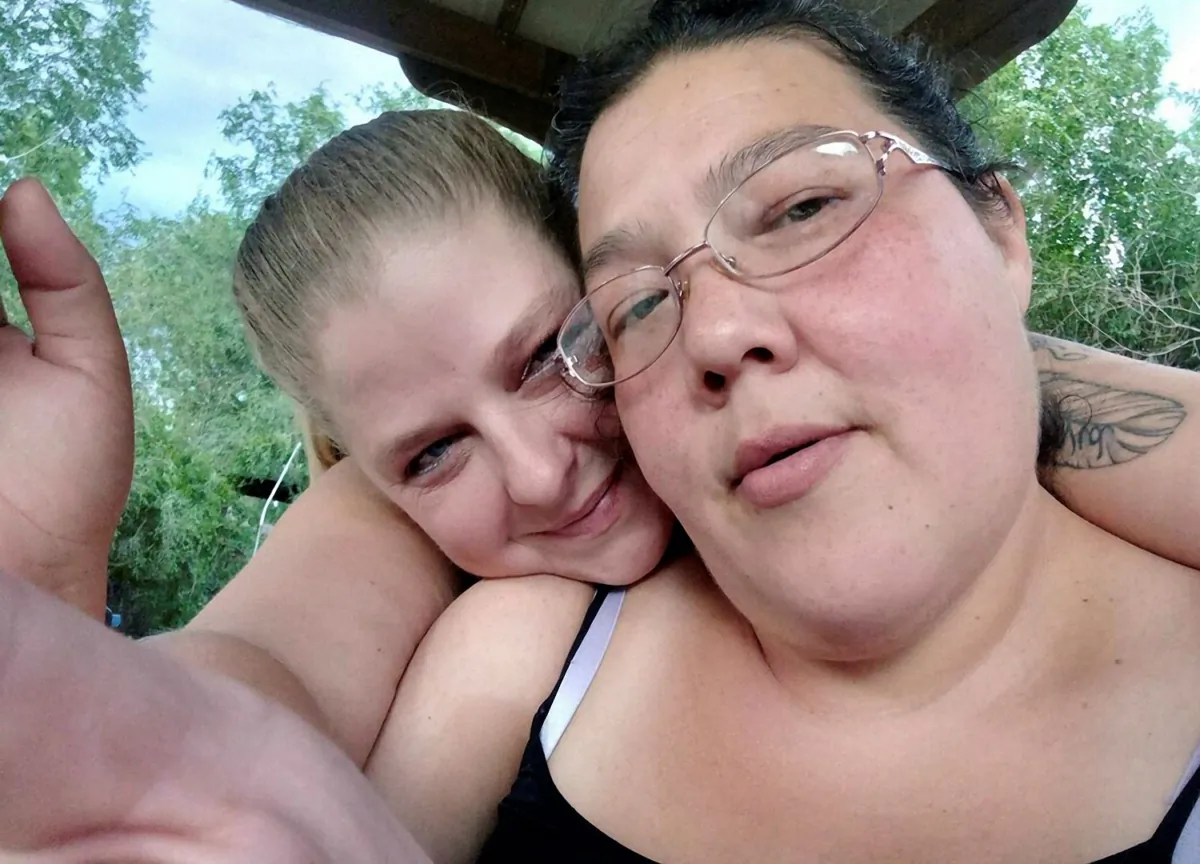 This selfie photo shows Trevala Jara, (L), and Christine Vance posing for a photo together, Colo., in July 2022. (Trevala Jara via AP)