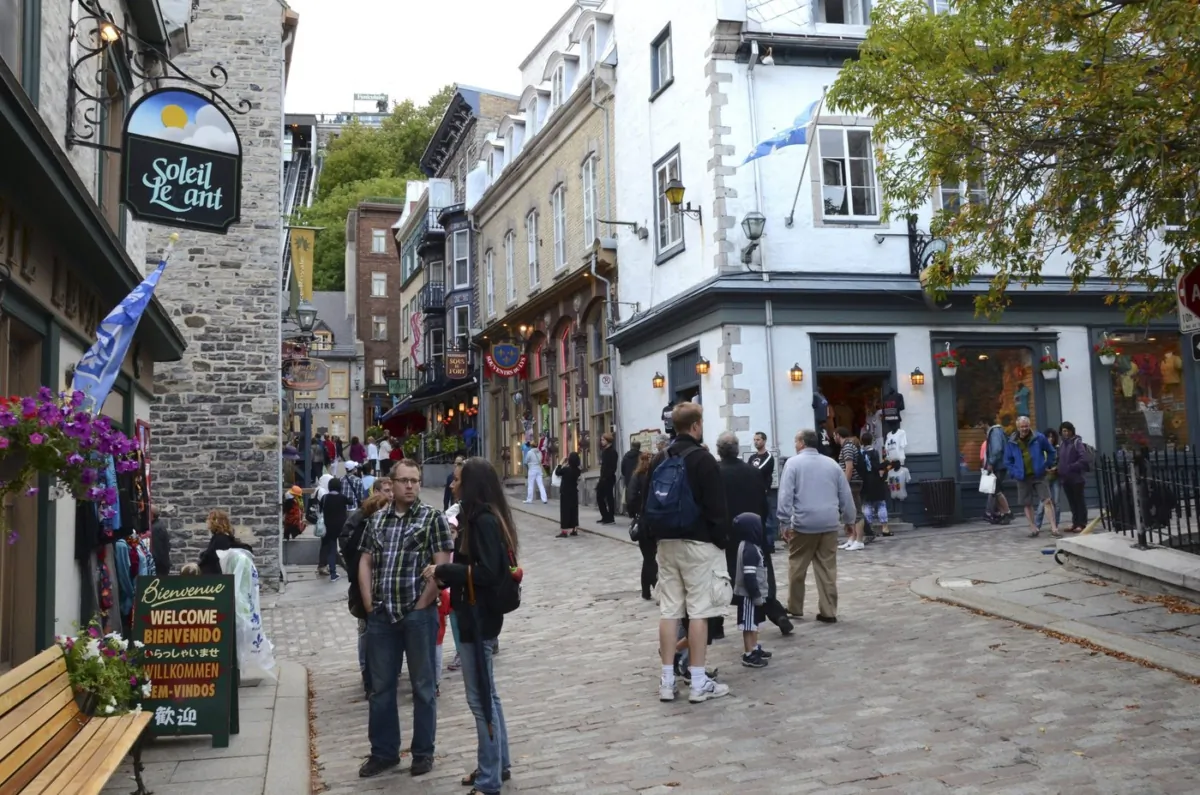 People stroll through old Quebec City, on Aug. 13, 2013. (The Canadian Press/AP-Cal Woodward)