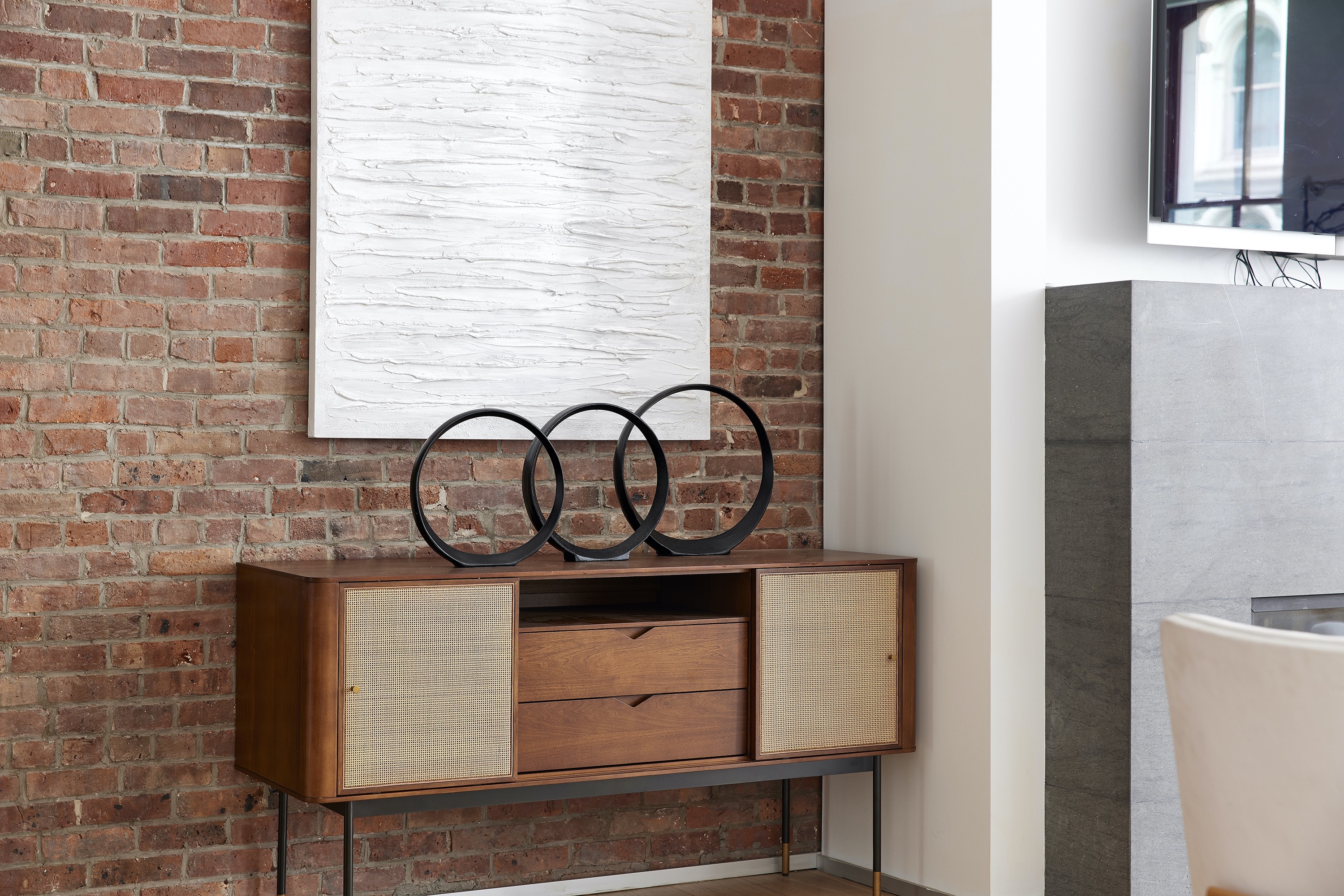 A wood sideboard adds an element of warmth.  