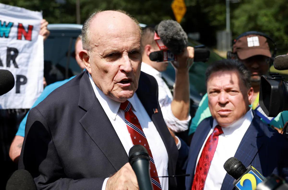 Rudy Giuliani speaks to the media after leaving the Fulton County jail in Atlanta on Aug. 23, 2023. (Joe Raedle/Getty Images)