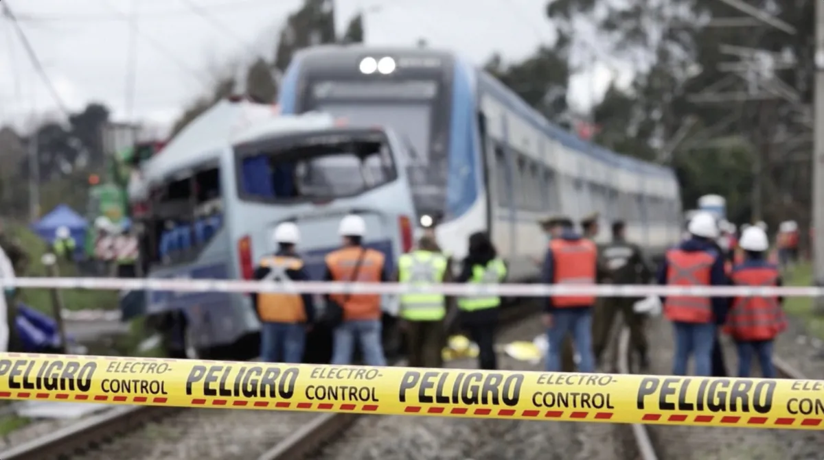 Rescue teams work on the scene of a crash between a train and a minibus in Concepción City, Biobio regione, Chile, on Sept. 1, 2023, in a still from video. (Reuters/Screenshot via The Epoch Times)