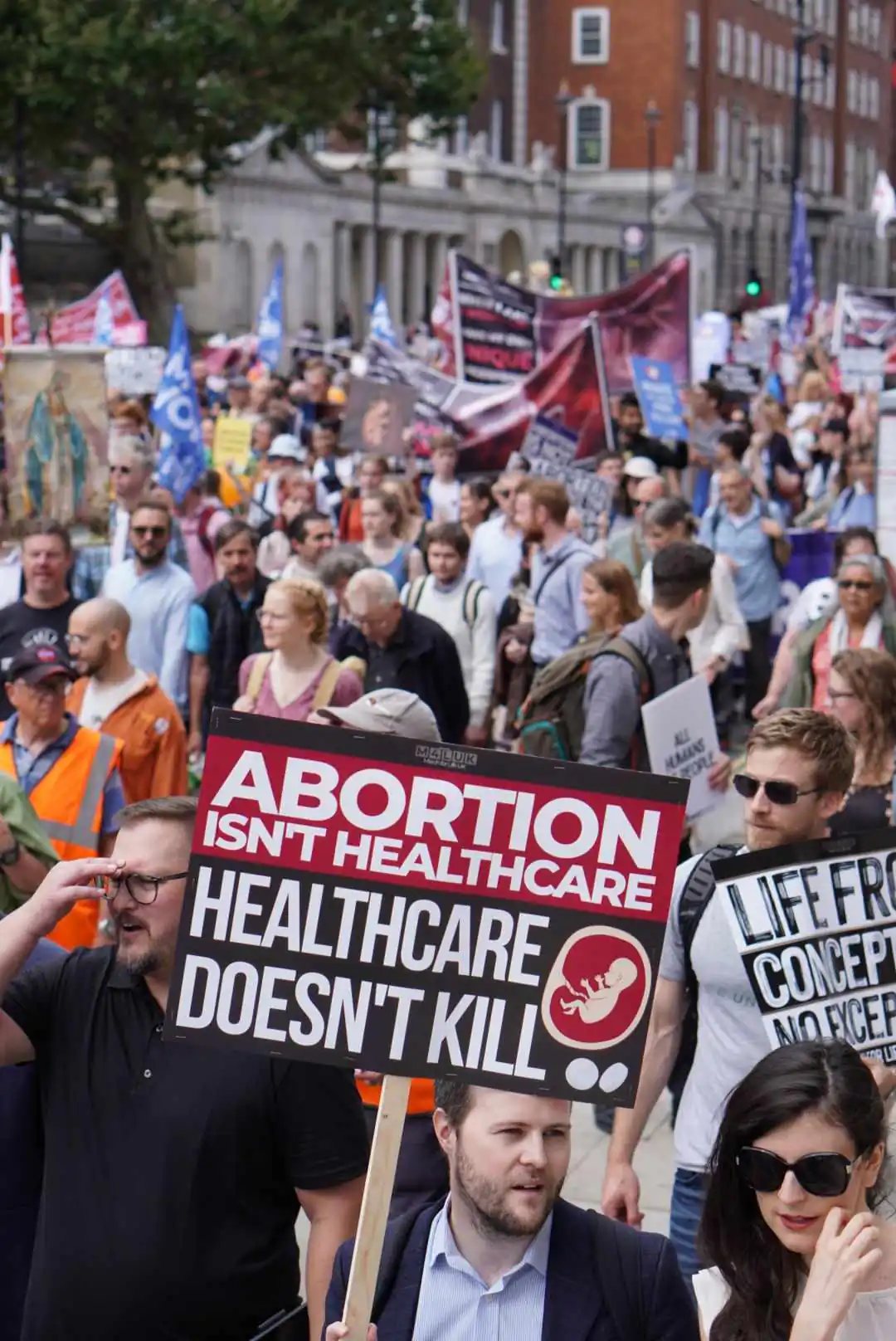Pro-life protesters hold signage emphasizing the rights of the unborn during the March for Life in London on September 02, 2023. (Sophia Rumpus)