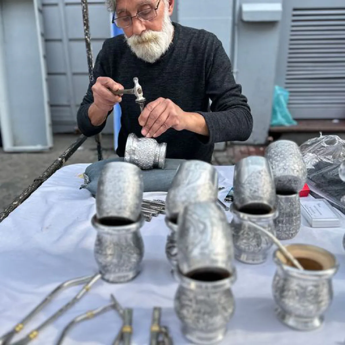 A local artisan works on mate cups at Feria de San Telmo Sunday market in Buenos Aires, Argentina. (Photo courtesy of Margot Black)